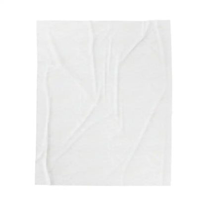 Wrinkled white paper sheet beside Blue Blanket with Newport Text Pattern design
