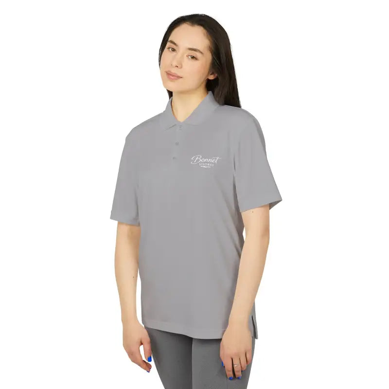 Gray polo shirt featuring Bonnet Shores Embroidered Adidas Unisex Performance design
