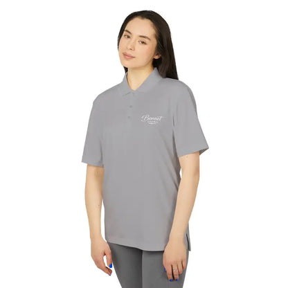 Gray polo shirt featuring Bonnet Shores Embroidered Adidas Unisex Performance design