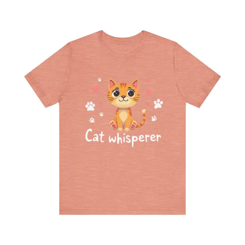 Salmon-colored Cat Whisperer Unisex Short Sleeve Tee featuring a cartoon cat design