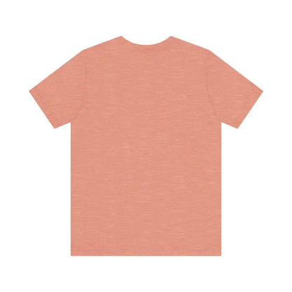 Peach-colored Cat Whisperer Unisex Short Sleeve Tee displayed on a white background