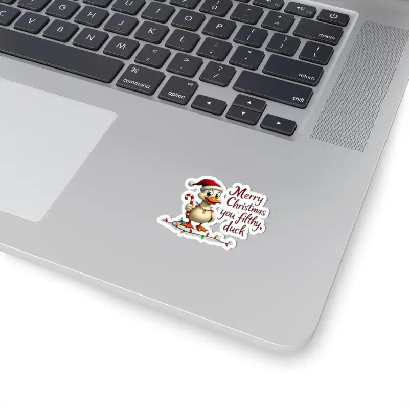 Christmas Duck Kiss Cut Sticker featuring a festive duck design on a laptop