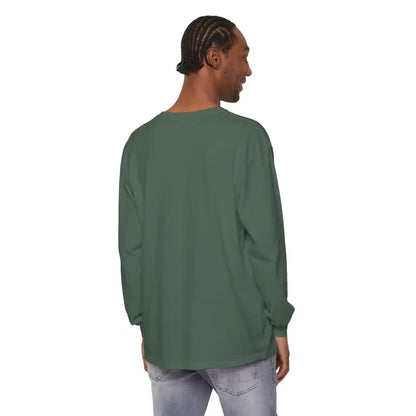 Man wearing a green long-sleeved Christmas Filthy Duck shirt