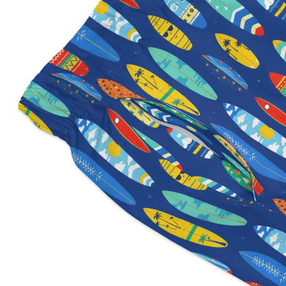 Blue swim trunks with a surfboard pattern for beach days and summer fun