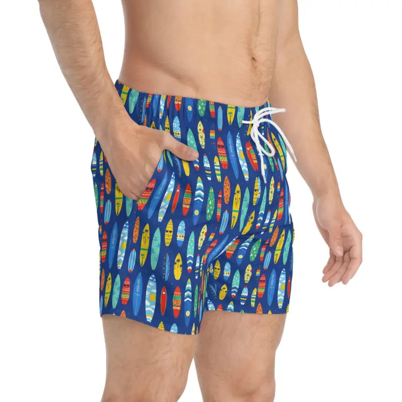 Blue swim trunks featuring a surfboard pattern for beach and summer activities