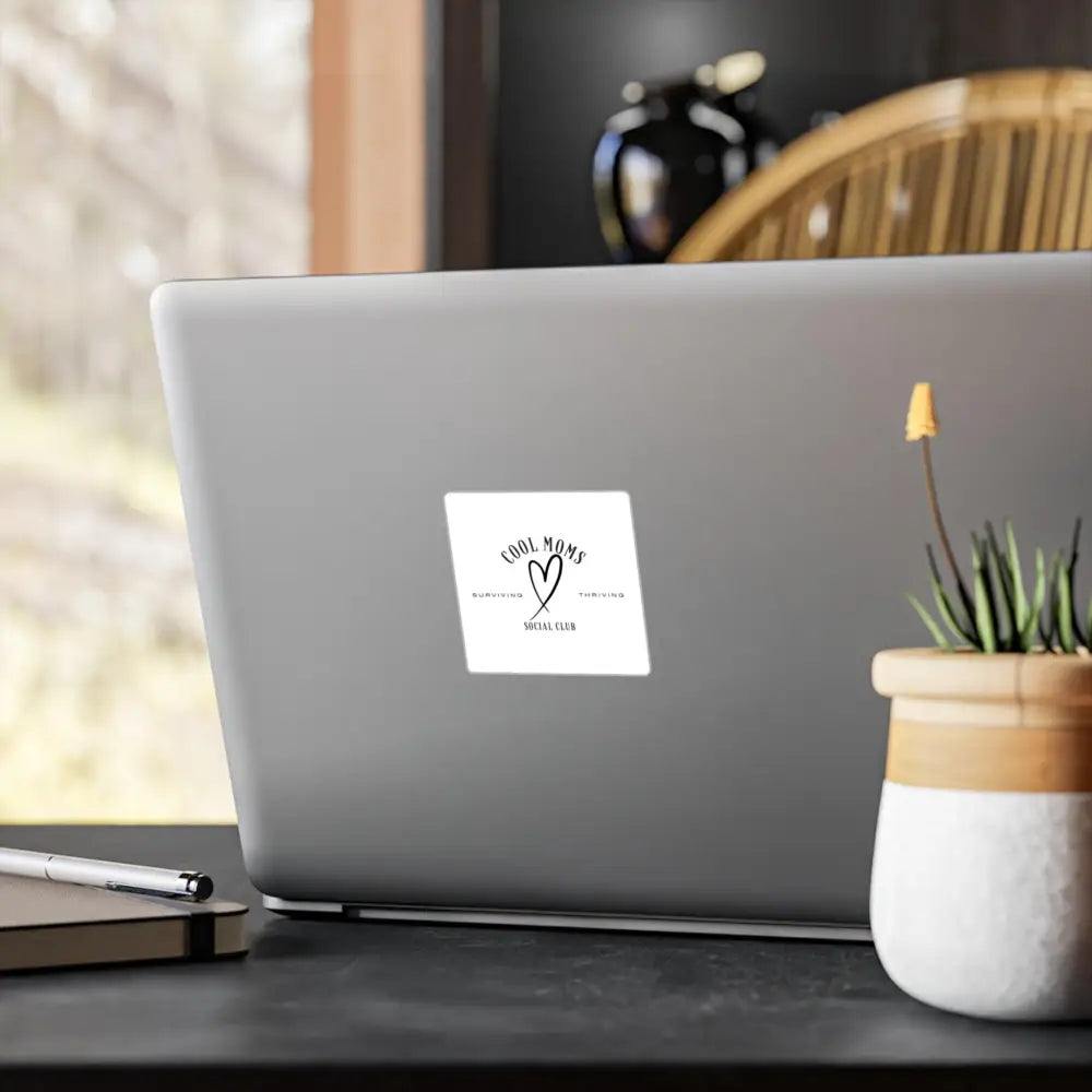 Laptop featuring Cool Moms Social Club Decal Stickers for a stylish look