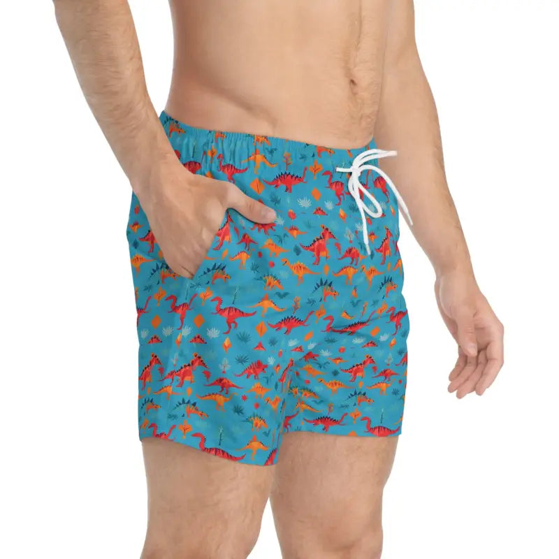 Dinosaur-patterned men’s swim trunks showcased in the Dinosaur Print Swim Trunks product image