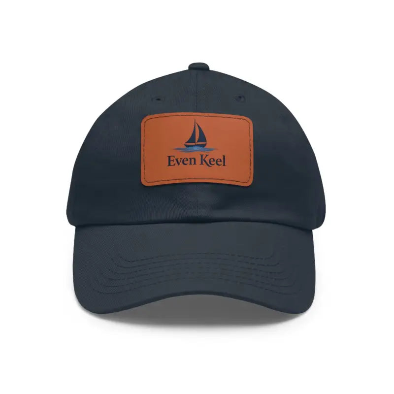 Navy blue baseball cap featuring a leather patch from Even Keel Signature Dad Hat