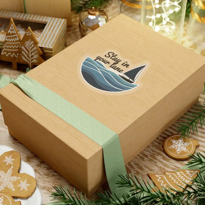 Wrapped gift box featuring Even Keel Stay Your Lane Nautical Sailboat Sticker