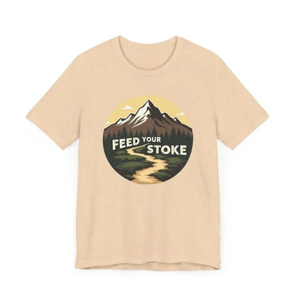 Beige t-shirt featuring a mountain graphic from the Feed Your Stoke collection