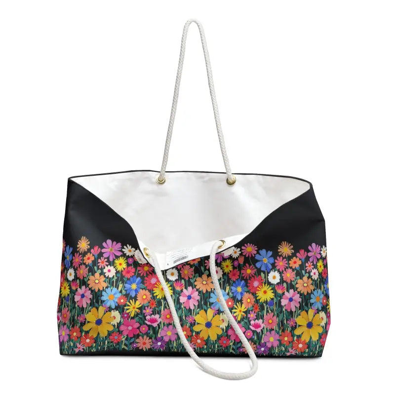 Floral Weekender Bag featuring a colorful blossom design and rope handles