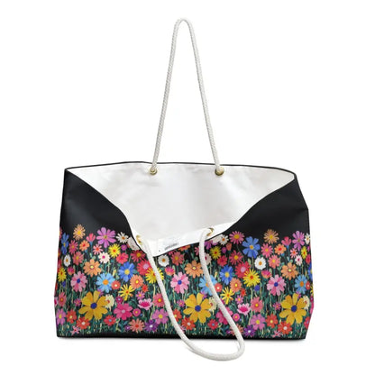 Floral Weekender Bag featuring a colorful blossom design and rope handles