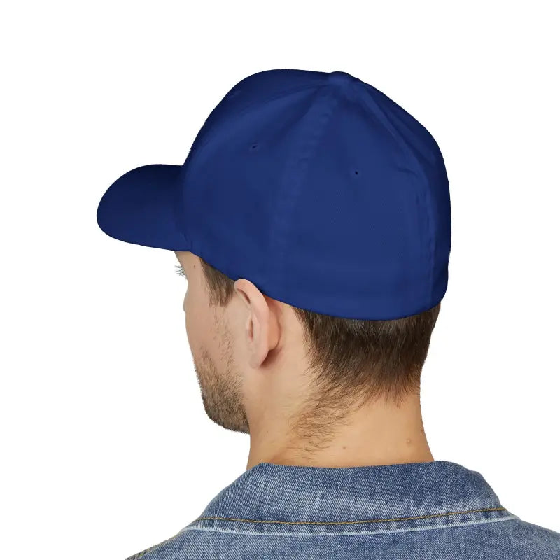 Blue baseball cap worn by a person, featuring Newport Rhode Island embroidery