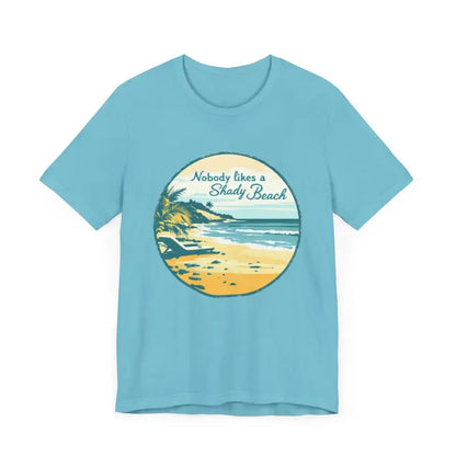 Blue t-shirt featuring a beach graphic for Nobody Likes a Shady Beach Unisex Tee