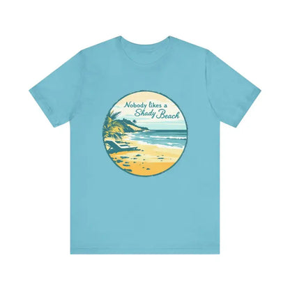 Light blue t-shirt featuring beach graphic from Nobody Likes a Shady Beach Unisex Tee