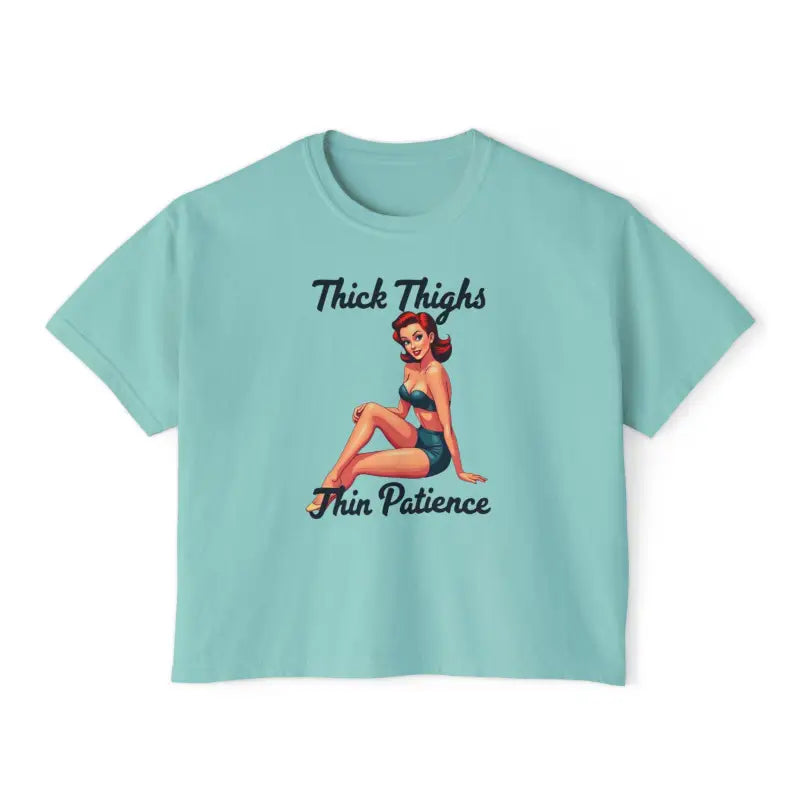 Teal t-shirt featuring a stylish pin-up girl from the Pinup Girl Collection