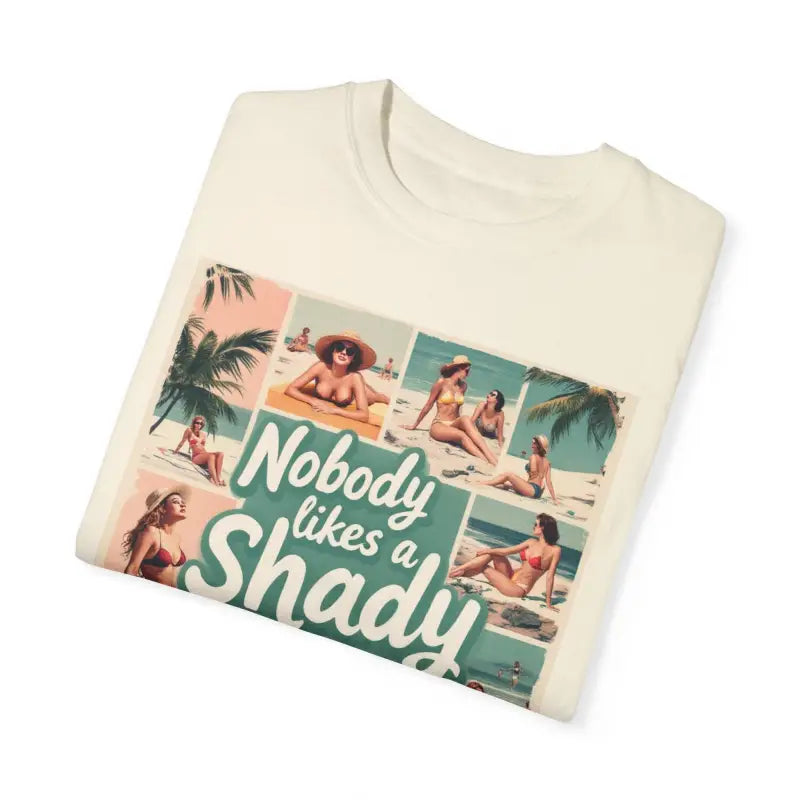Folded Retro Beach Collage T Shirt featuring a vibrant beach-themed graphic