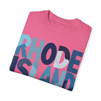 Folded pink Rhode Island Unisex Garment Dyed Summer T Shirt on a clean surface