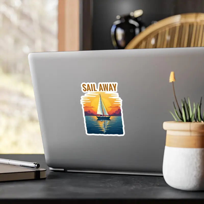 Sailboat at Sunset Vinyl Decal on a laptop, ideal for ocean lovers and adventurers