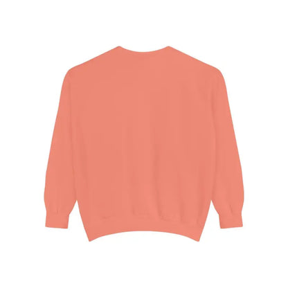 Salmon-colored knit sweater from Sitting on the Dock Bite Me Unisex Garment Dyed Sweatshirt