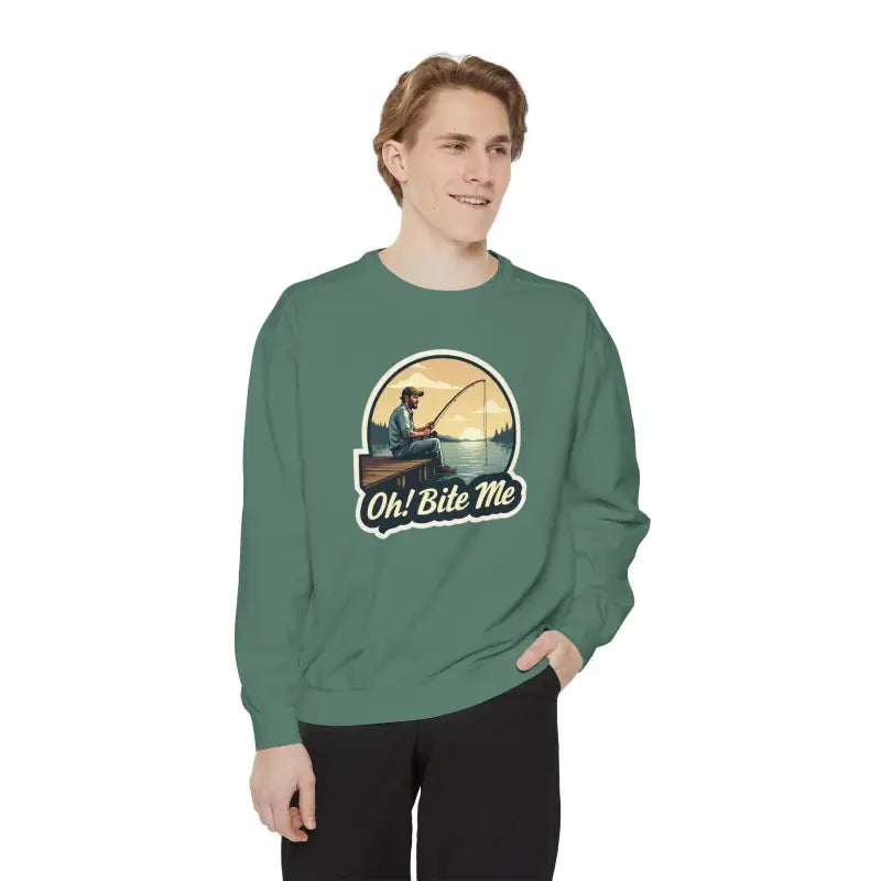 Green sweatshirt featuring a fishing graphic from the Sitting on the Dock collection