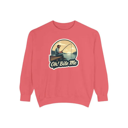 Salmon-colored sweatshirt featuring fishing graphic from Sitting on the Dock Bite Me collection