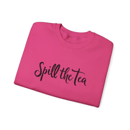 Folded pink t-shirt featured in Spill the Tea Sweatshirt for cozy casual style