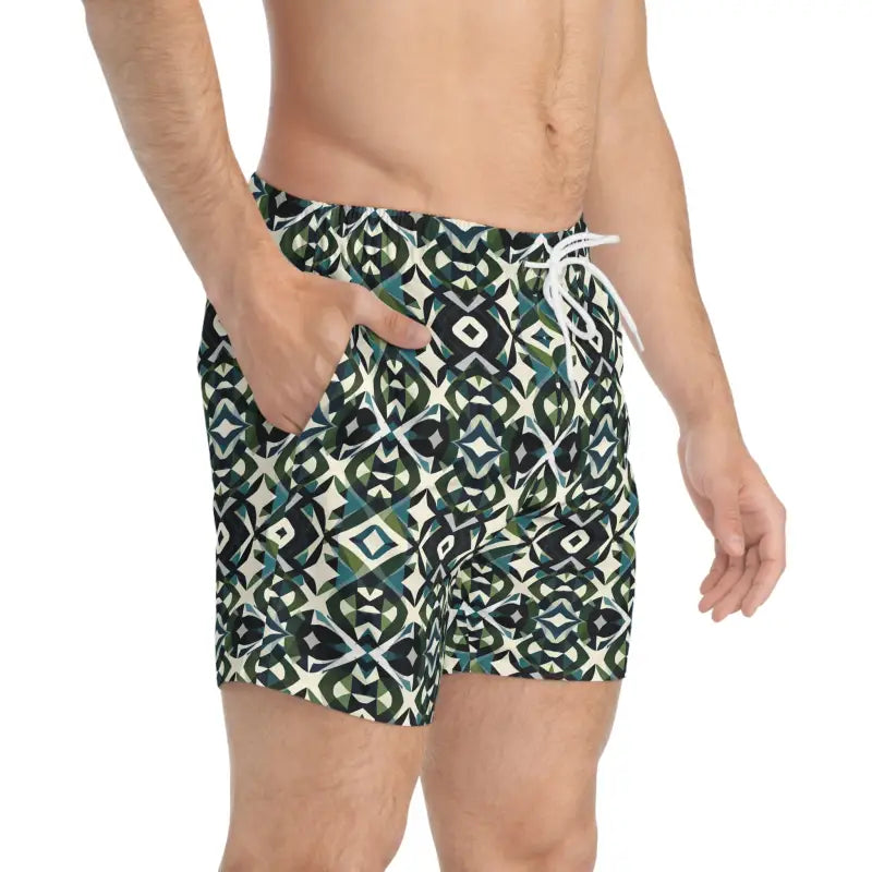 Patterned men’s swim trunks with green and black geometric design for summer enjoyment