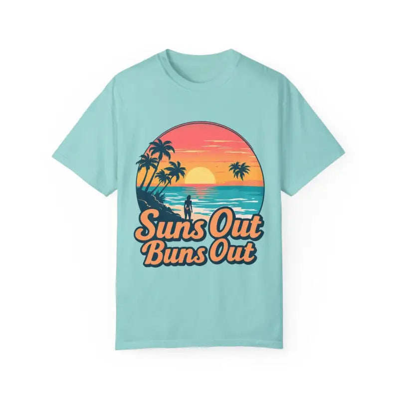 Light blue Suns Out Buns Out t-shirt featuring a vibrant beach graphic