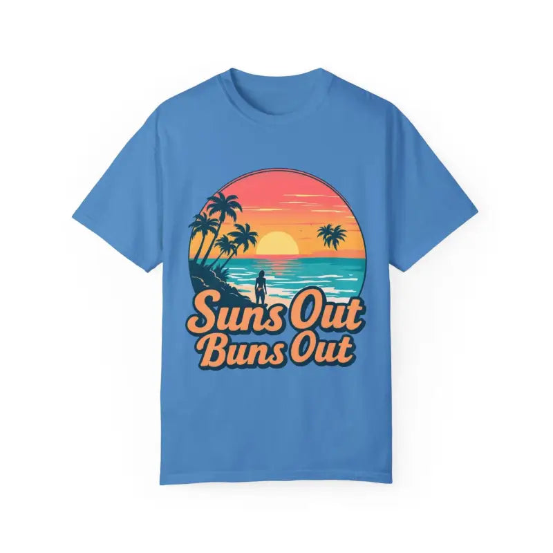 Blue t-shirt featuring beach graphic from Suns Out Buns Out unisex summer collection