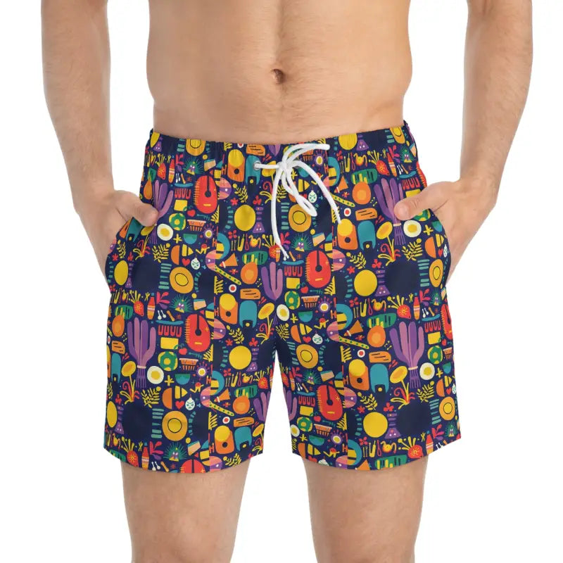 Patterned men’s swim trunks with vibrant design on a white background