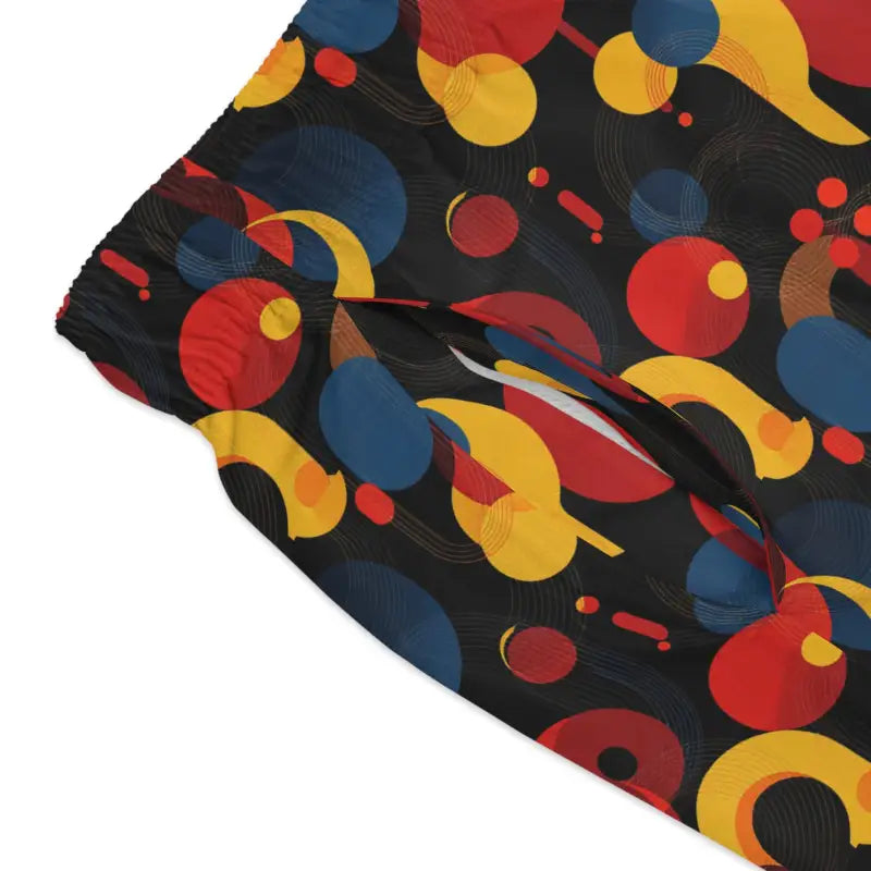 Patterned drawstring shorts for men in vibrant retro style, ideal for summer beach activities
