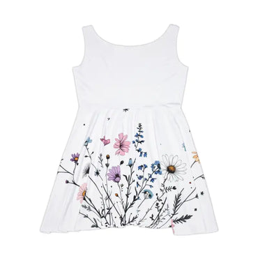 White sleeveless dress featuring a vibrant floral print, ideal for summer occasions